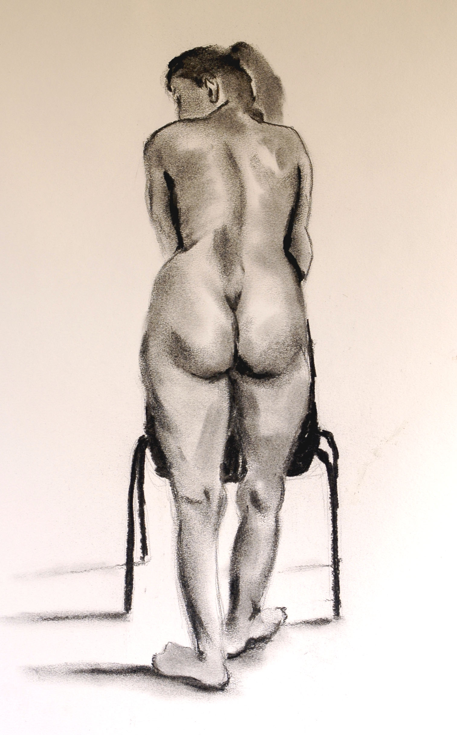 charcoal drawing of a female nude.